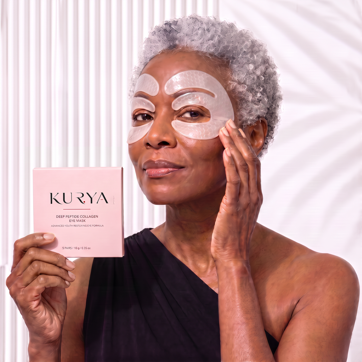 Woman relaxing with Kurya collagen eye mask patches applied